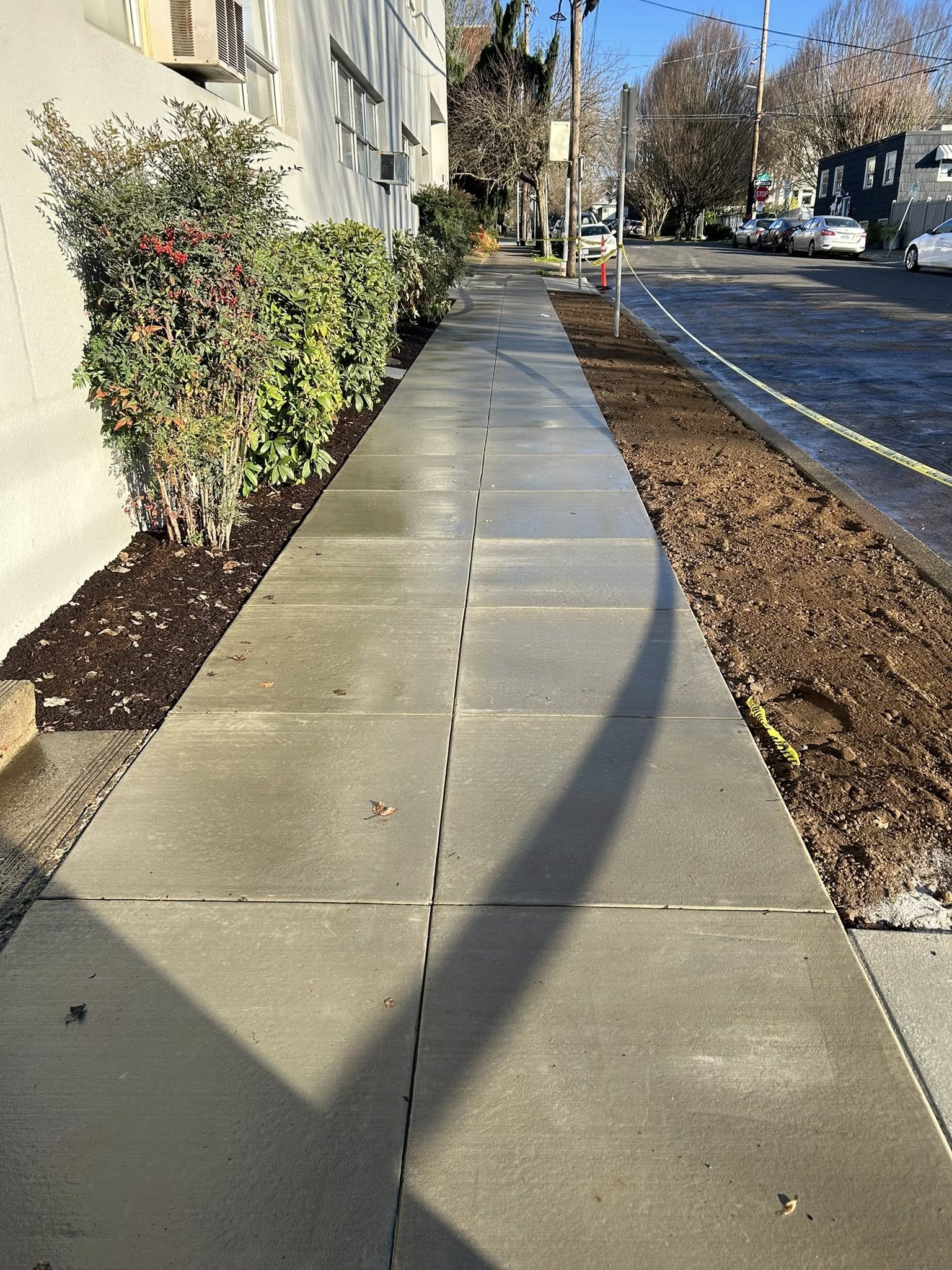 AC Concrete sidewalk after